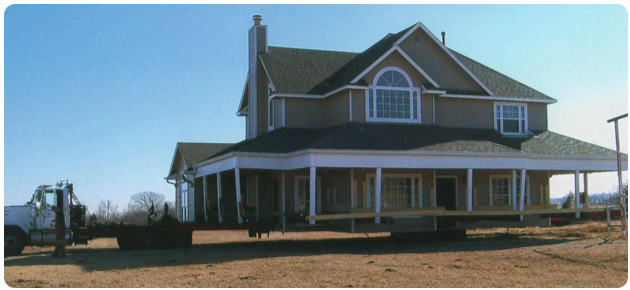 picture of house on a truck